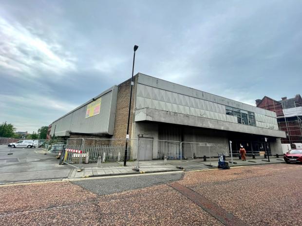 The Northern Echo: Work is getting underway to demolish the former Sports Direct warehouse in East Street, Darlington Picture: SARAH CALDECOTT